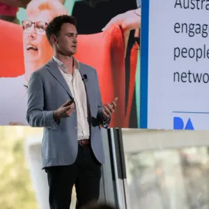 Speaker presenting on stage